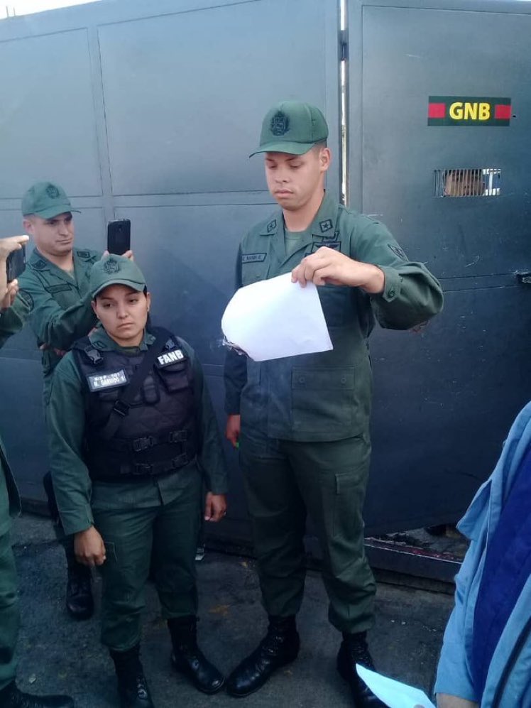 At the command of the National Guard(GNB) in Petare soldiers burn document with the Amnesty Law delivered by a group of citizens.