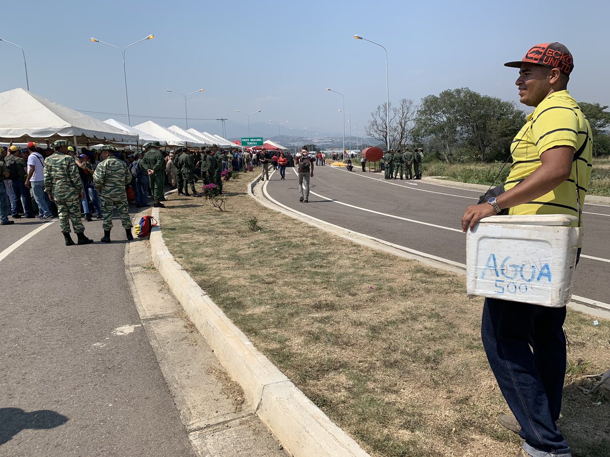 At a Venezuelan government event to defend national sovereignty, street hawkers charge in Colombian pesos.   