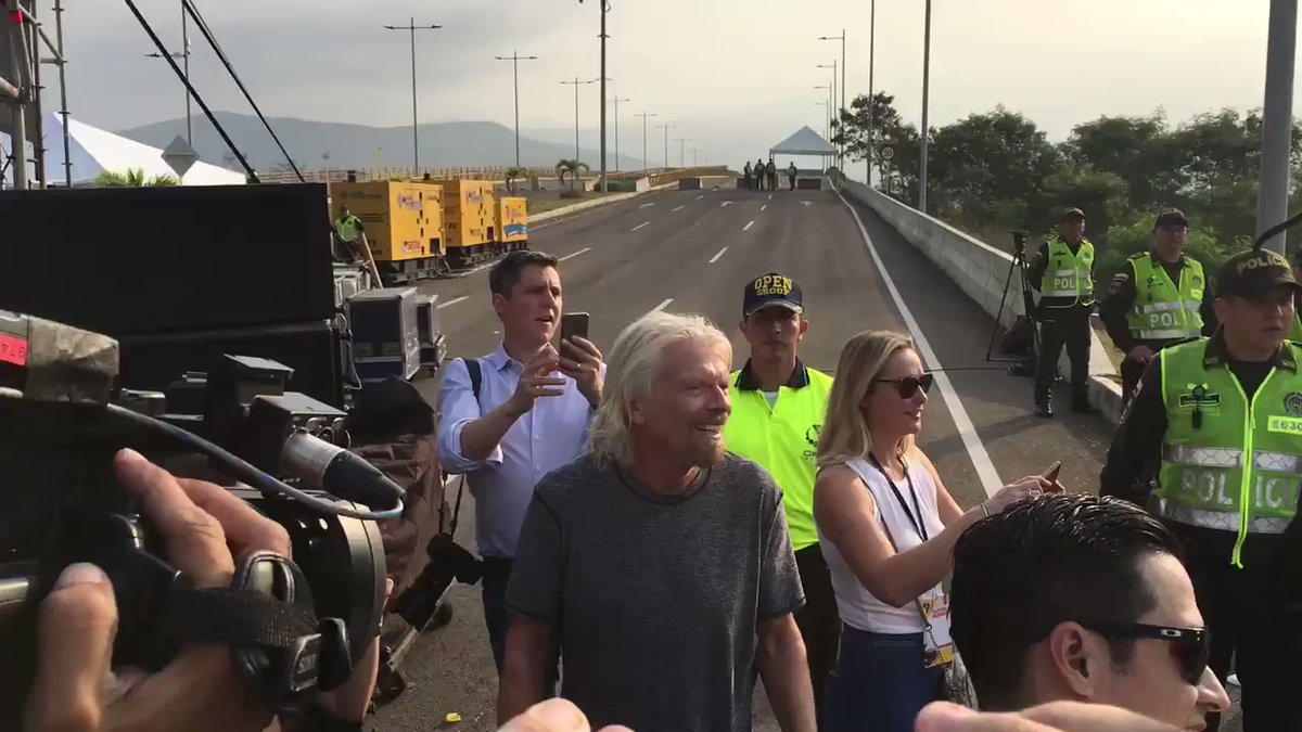 Richard Branson, main promoter of the Venezuela Live Aid event, greets the attendees