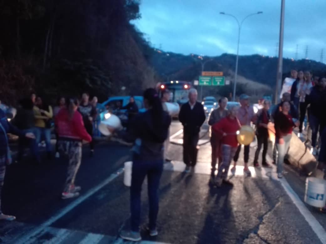 Neighbors from the upper part of La Vega in Caracas protest on the Pan-American Highway against water shortages. 