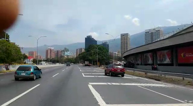 Armored vehicles of the National Guard remain behind the Bicentennial of Plaza Venezuela