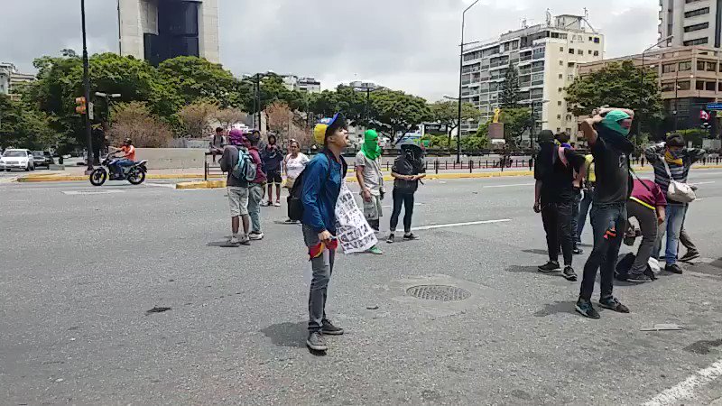 Protesters are gathered in the Plaza Altamira