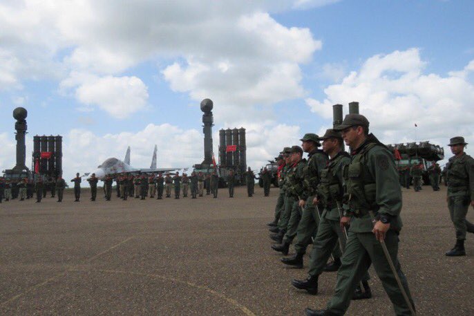 Some of the clearest photos of Venezuela's S-300 system.  SU-30 and S-125 transloaders also present.  