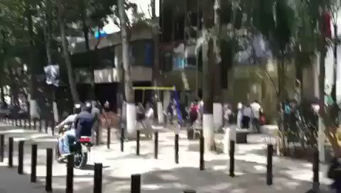 Colectivos shot rounds into the air to disperse a teachers protest in Caracas. A single PNB motorbike gave chase 