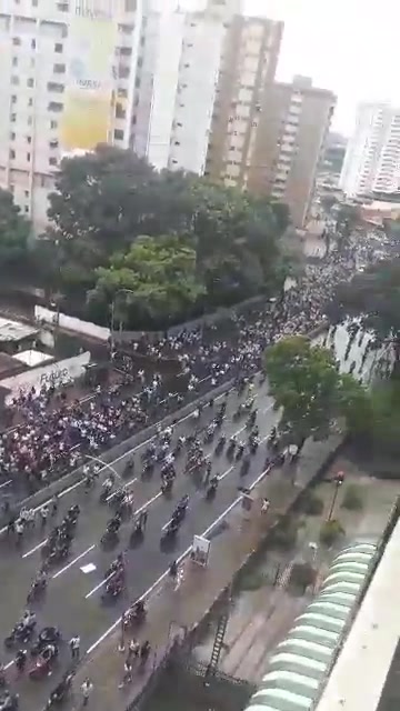 Avenida Francisco de Miranda in the area of La California. These people are walking from Petare, where there are protests against the election results announced by the CNE