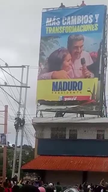 A Maduro election poster was torn down by protestors in San Jacinto, in northern Barquisimeto