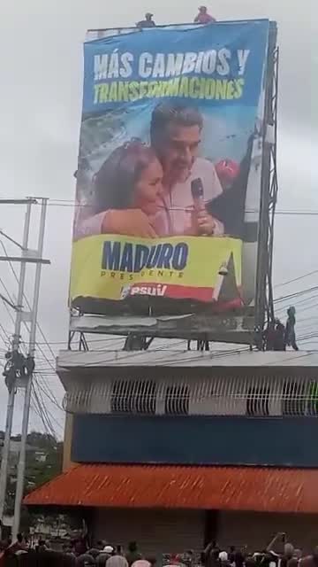 A Maduro election poster was torn down by protestors in San Jacinto, in northern Barquisimeto