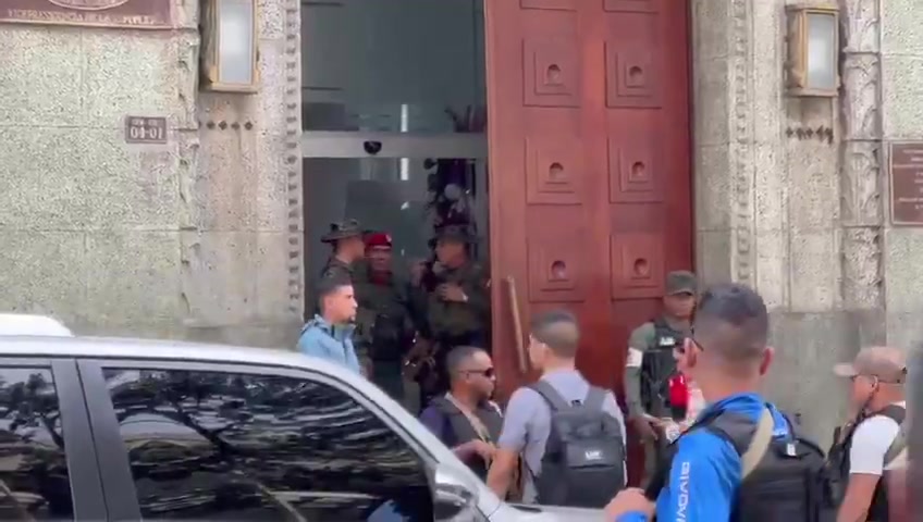 Vladimir Padrino López leaves after meeting with Delcy Rodríguez at the vice presidency