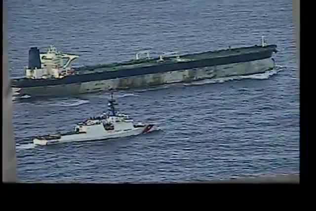 Footage of the USCGC Munro (WMSL-755), a Legend-class cutter with the U.S. Coast Guard, alongside the Russian-flagged Iranian-linked oil tanker, Marinera, during this morning’s operation to board and seize the vessel in the Northern Atlantic.