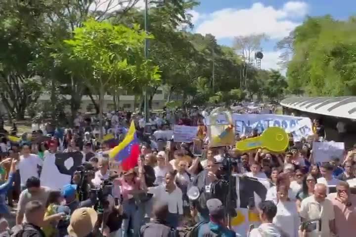 Hundreds of students march, demanding the release of political prisoners, in what is the largest protest the country has witnessed in months